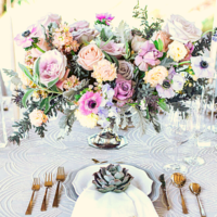 stunning wedding tablescape with lavender and lilac and succulents