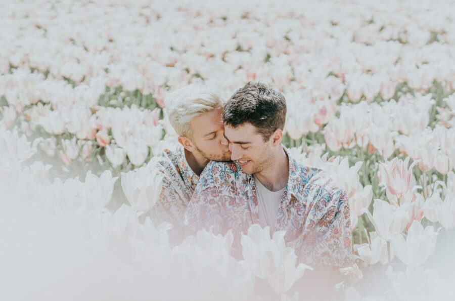 same-sex male couple kissing