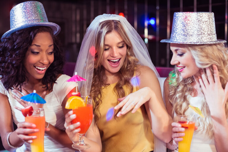 bride with bridesmaids celebrating engagement party