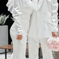wedding day for two brides wearing minimalist bridal fashion