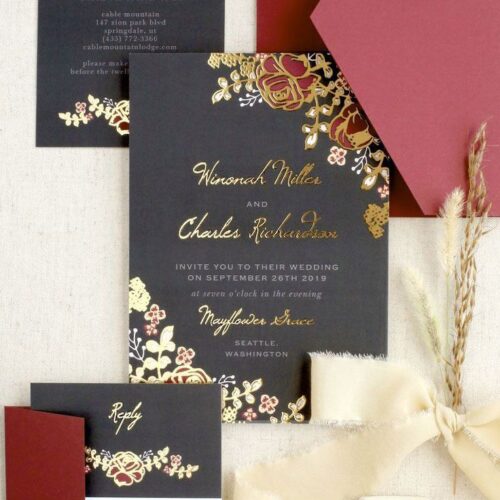 Stunning black wedding invitation with gold foil and flowers