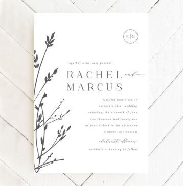 Simple wedding invitation in white with grass