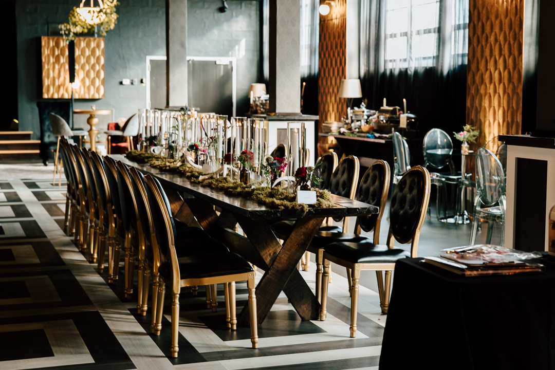 Dark and moody wedding reception space photographed by Bee Brook Photography