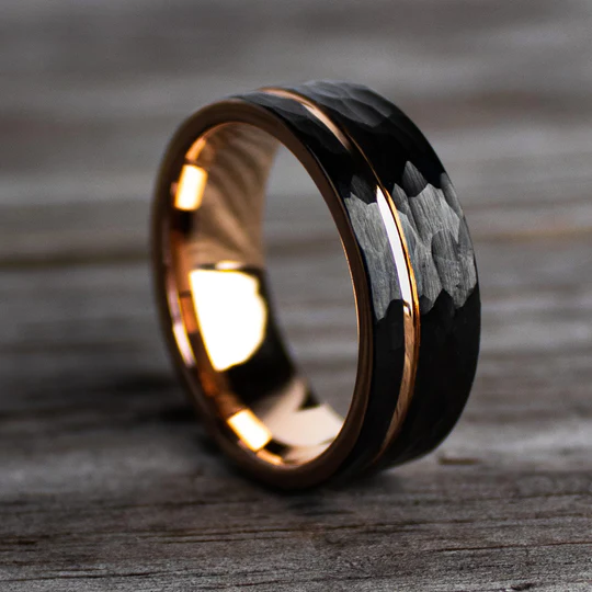 Stunning black hammered mens engagement ring with rose gold